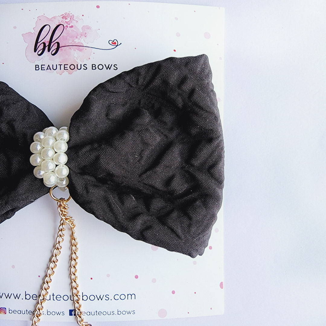 Black Dangling Heart Textured Bow